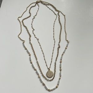 Lia Sophia triple strand gold necklace allows for 30-38” length styling